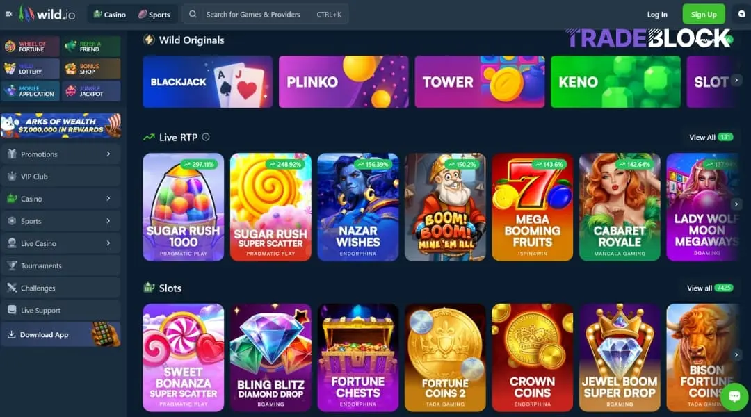 Wild.io casino homepage showing popular slots, wild original games, and Live RTP recommendations